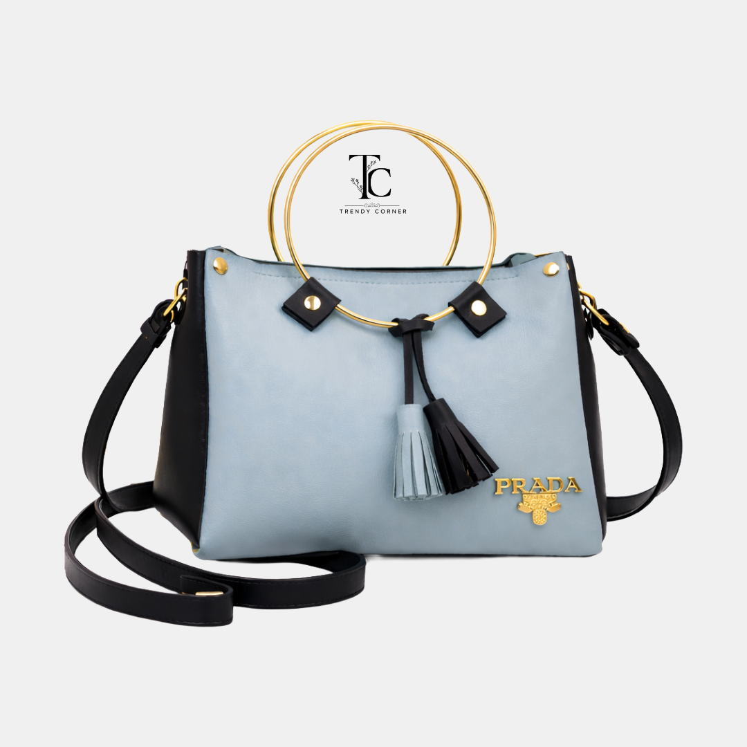 Gray and black women's shoulder bag with round shape and stylish design, perfect for casual and evening outings.