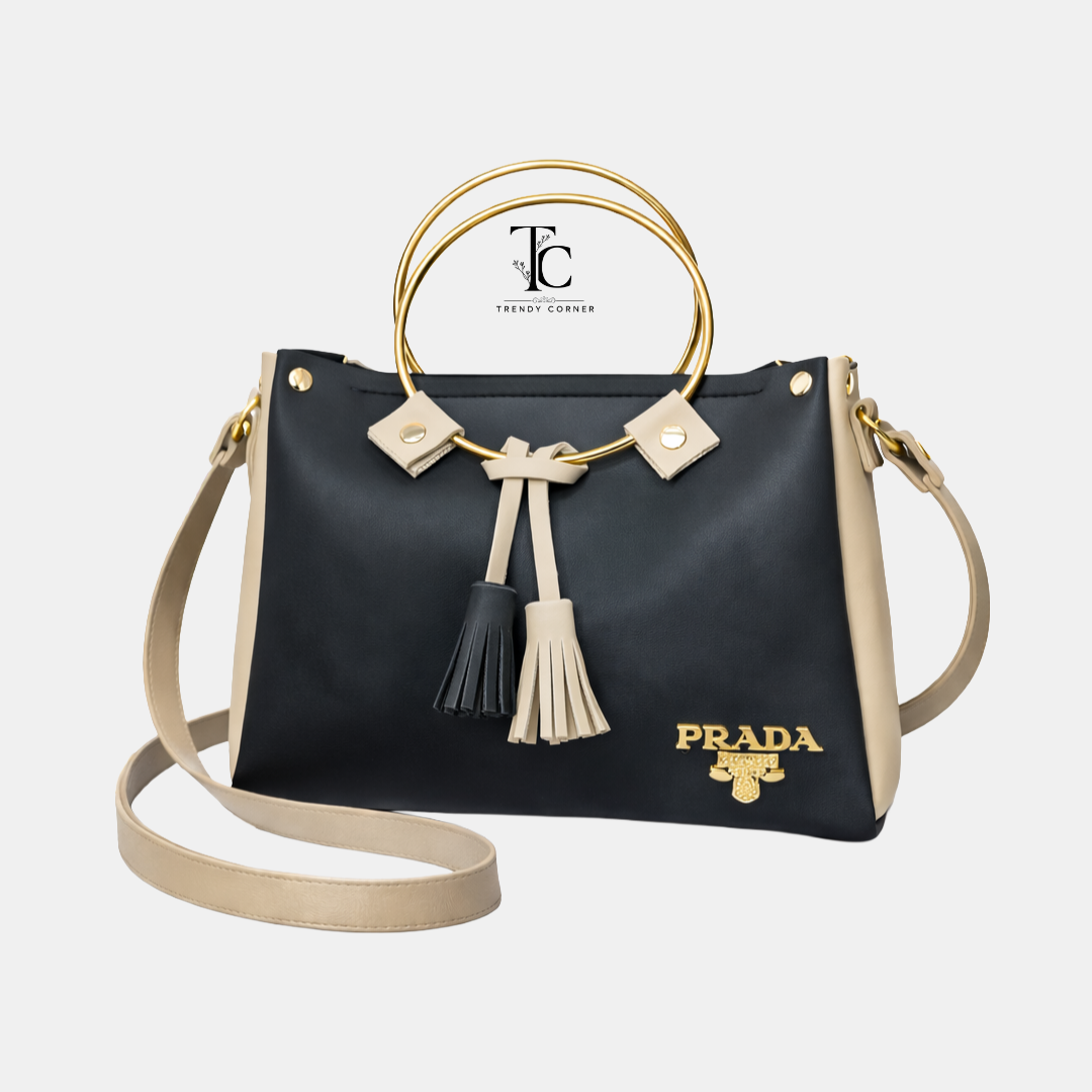 Black round women's shoulder bag with a sleek design, featuring a smooth surface and stylish strap, from Trendyspot.pk.