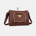Chocolate-colored women's shoulder bag from Trendyspot.pk with a sleek design and adjustable strap.