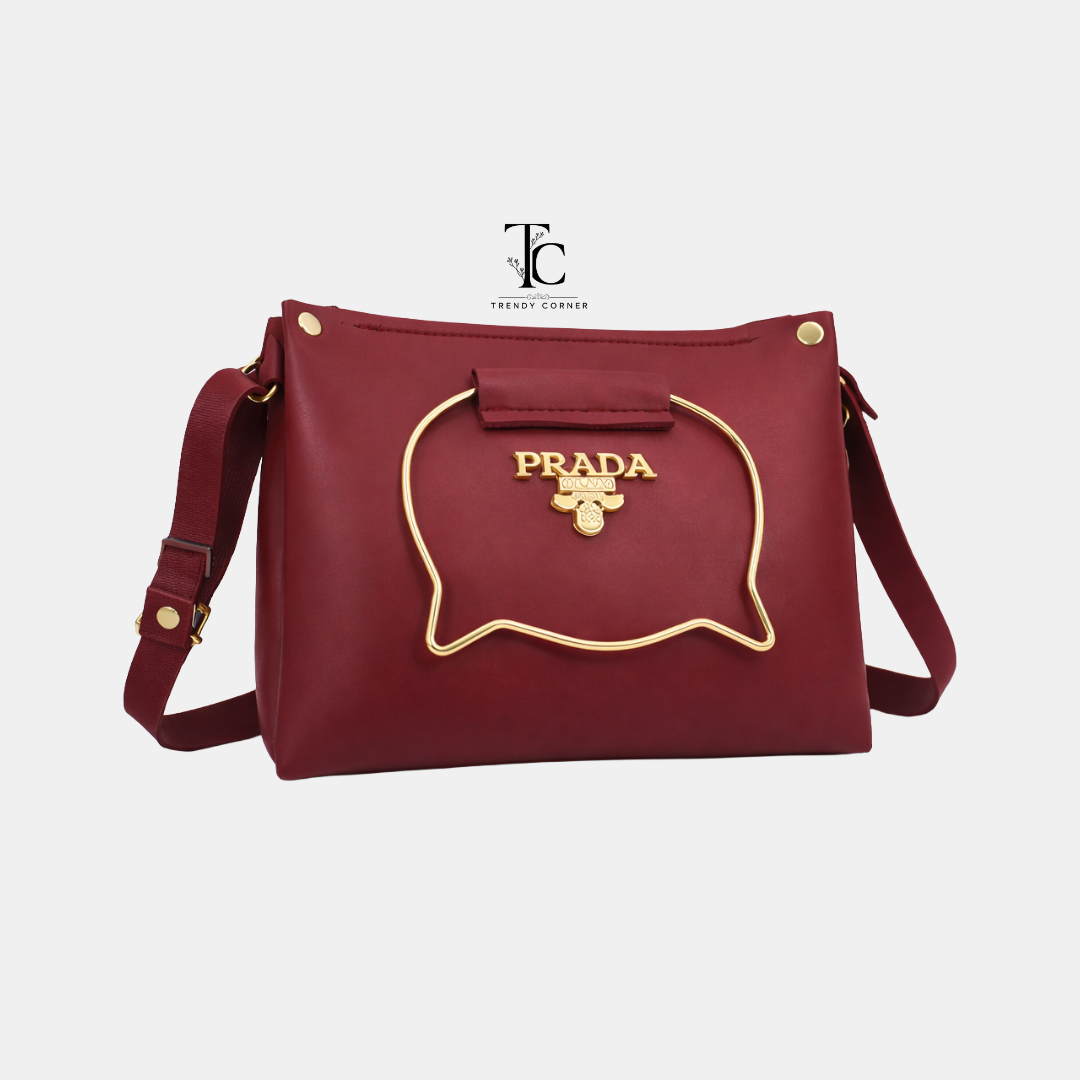 MEROON women's shoulder bag from Trendyspot.pk featuring a stylish design with a top handle and adjustable shoulder strap.