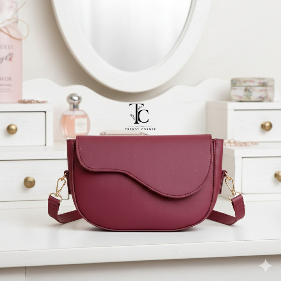 Curved flap Meroon women's shoulder bag with stylish design and adjustable strap, perfect for daily use and casual outings.