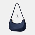 Blue women's shoulder bag with trendy design, featuring adjustable strap and spacious interior, from Trendyspot.pk.
